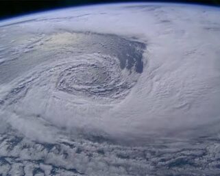 Satellite imagery captures low-pressure system driving heavy monsoon rain