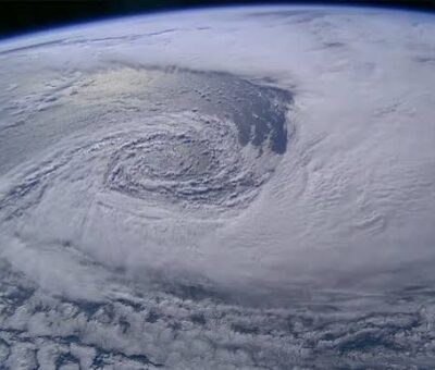 Satellite imagery captures low-pressure system driving heavy monsoon rain