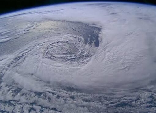 Satellite imagery captures low-pressure system driving heavy monsoon rain